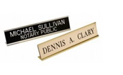 Professionally engraved plastic nameplate with or without a holder available in a variety of color combinations.